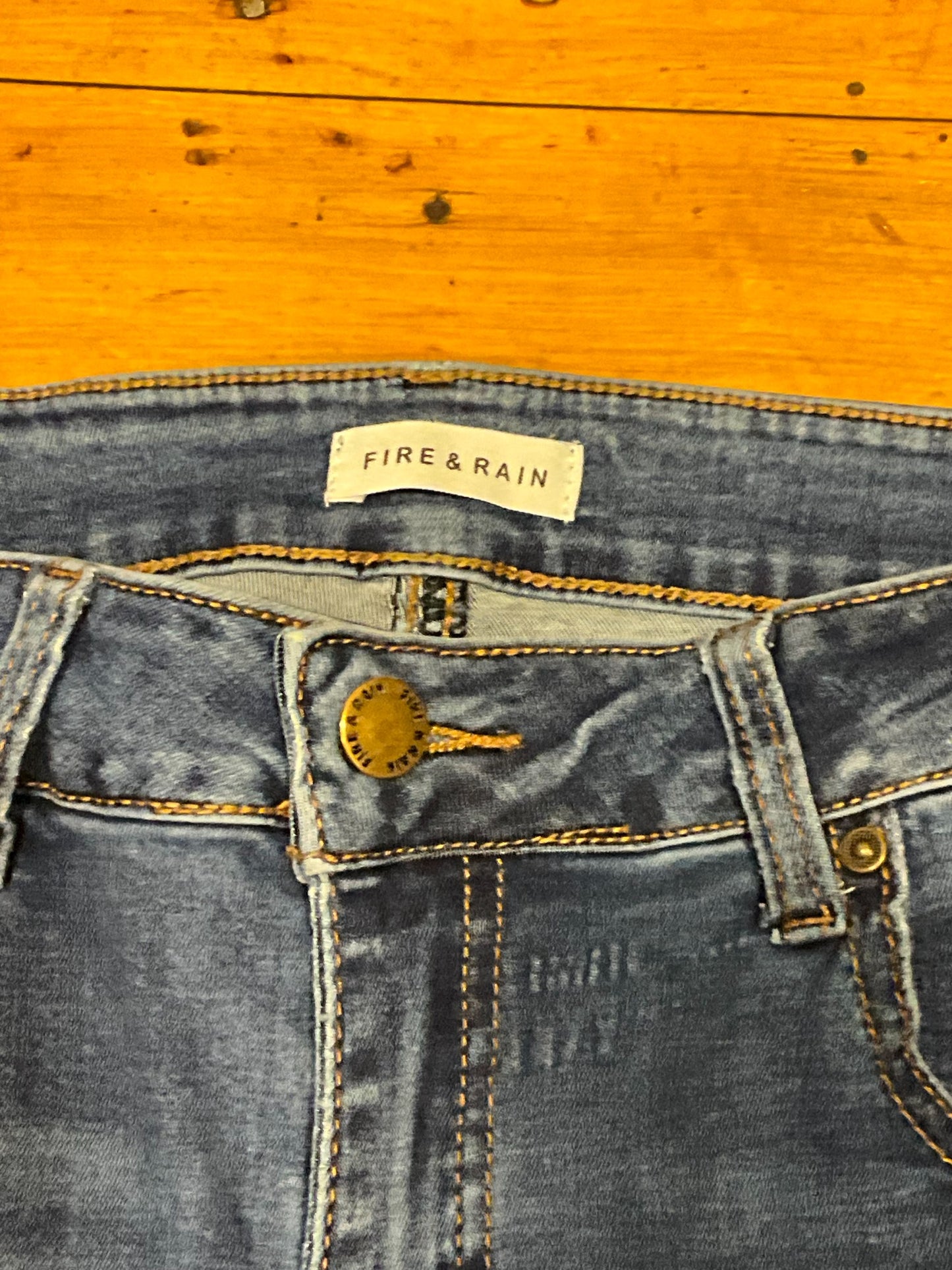 Fire and Rain jeans waistband brand label and button detail